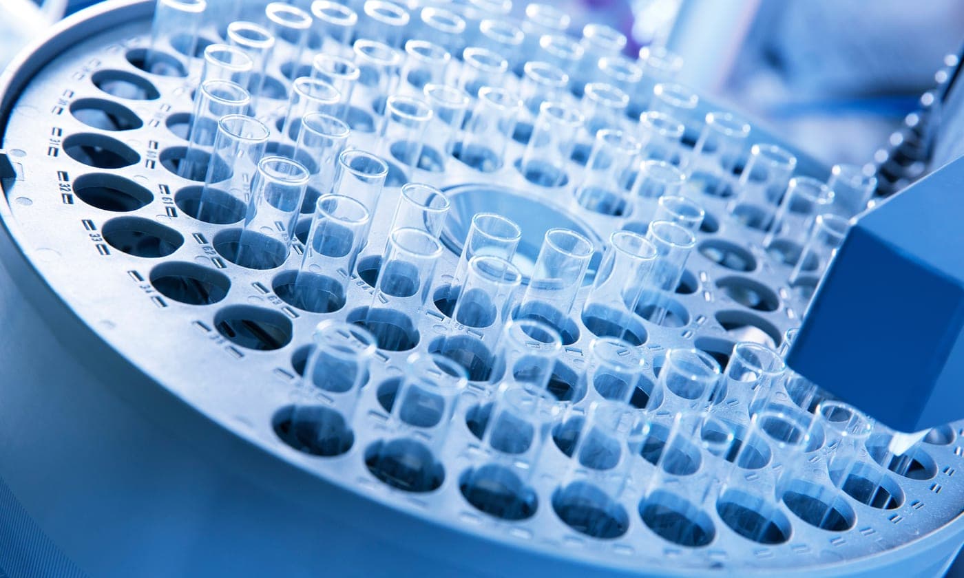 Validation documentation and vials on a qualified pharmaceutical line