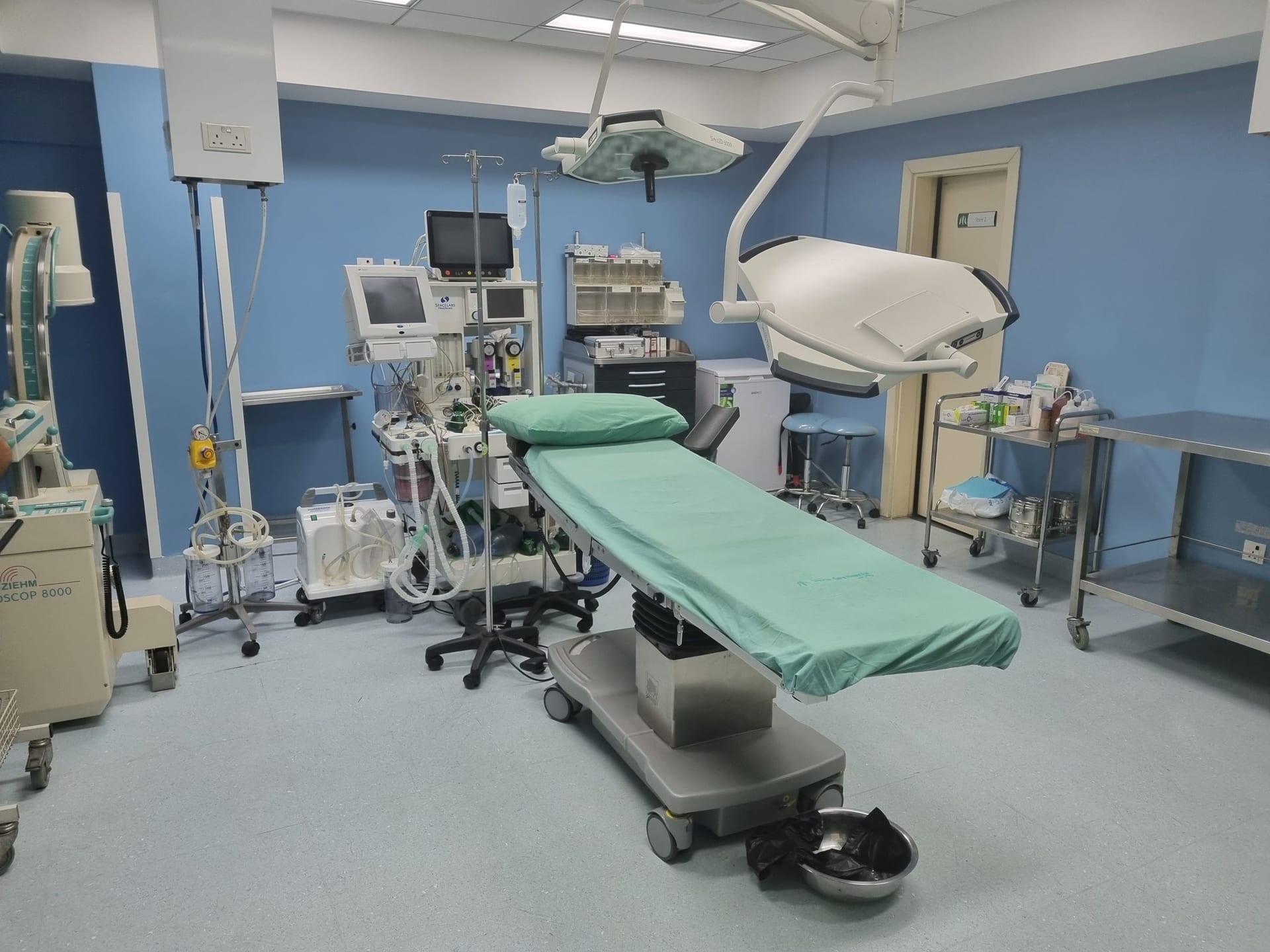 A large hospital building — infrastructure that has to stay open twenty-four hours a day