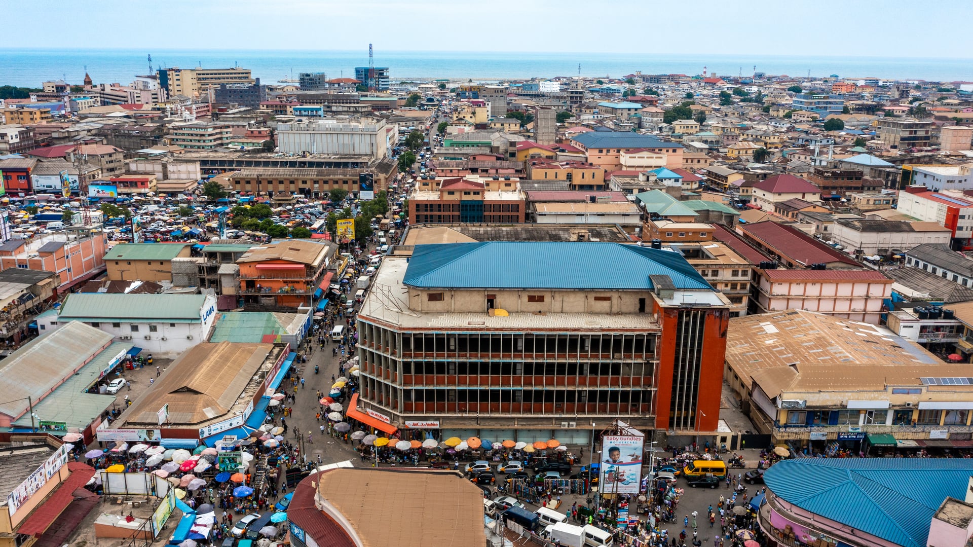 Aerial view over central Accra toward the Gulf of Guinea